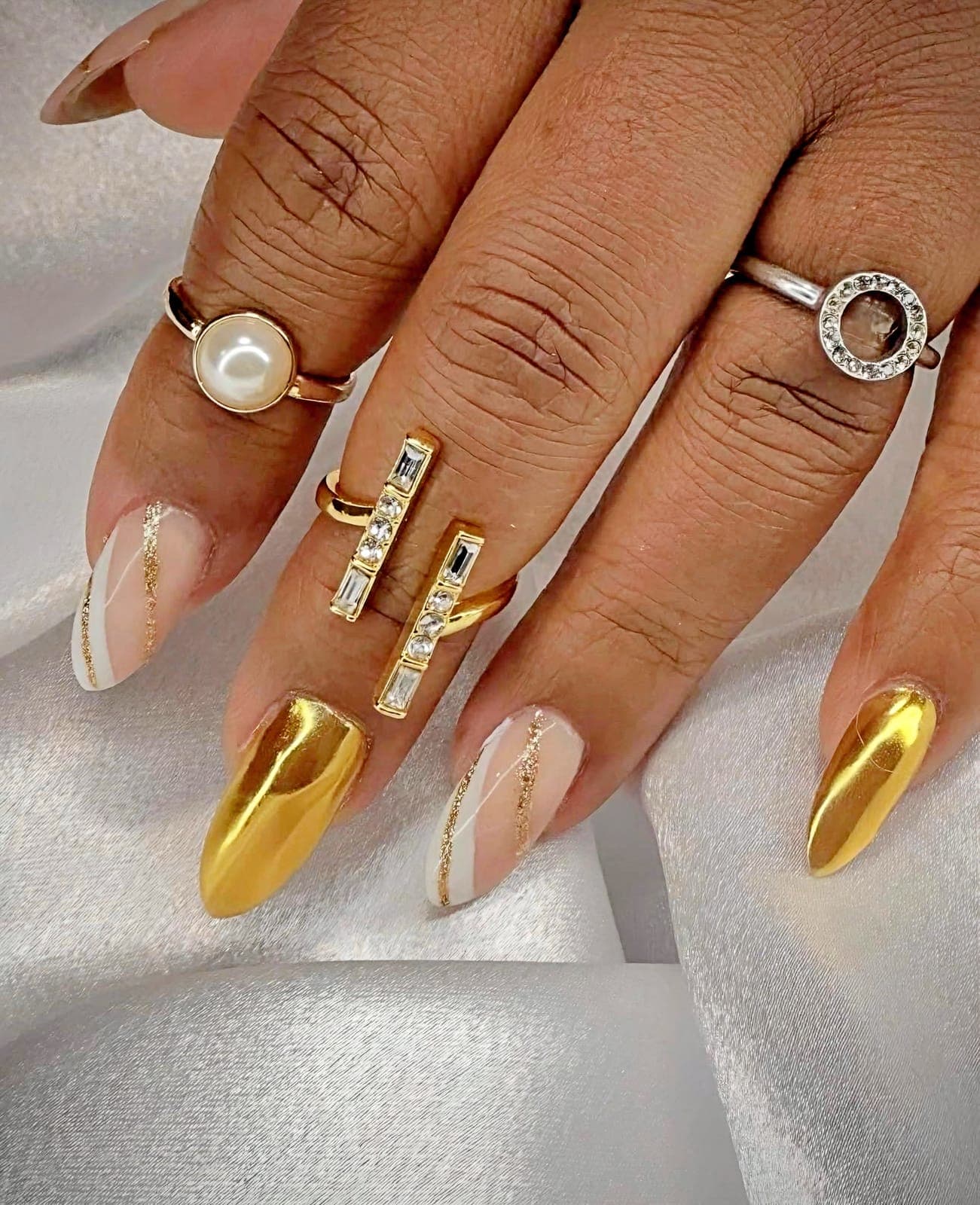 Gold chrome and marble almond nails