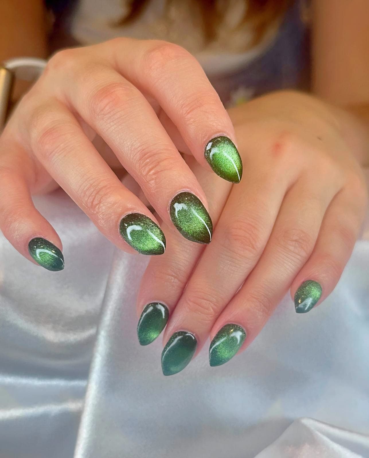 Green cat eye almond nails