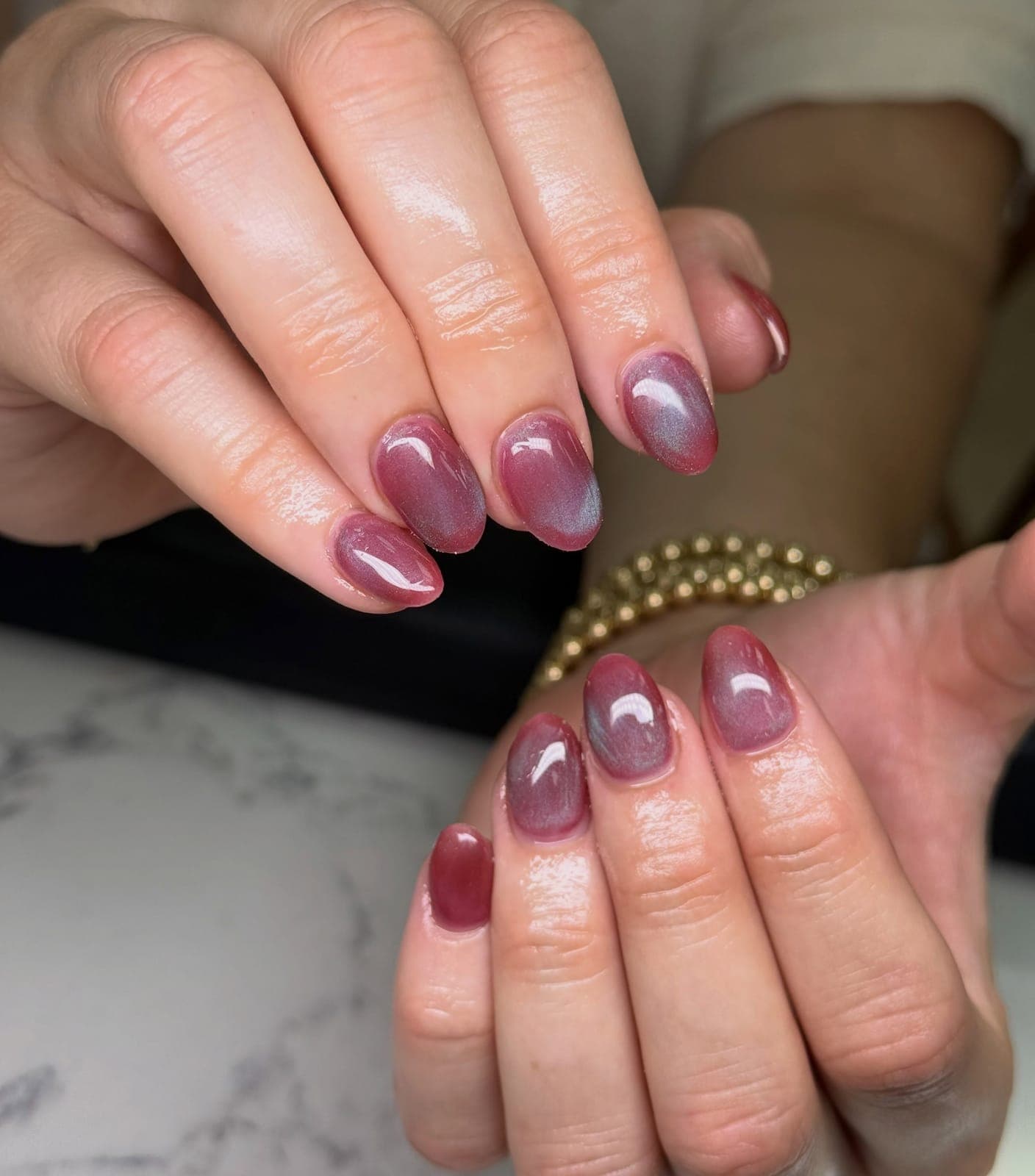 Short mauve cat eye nails