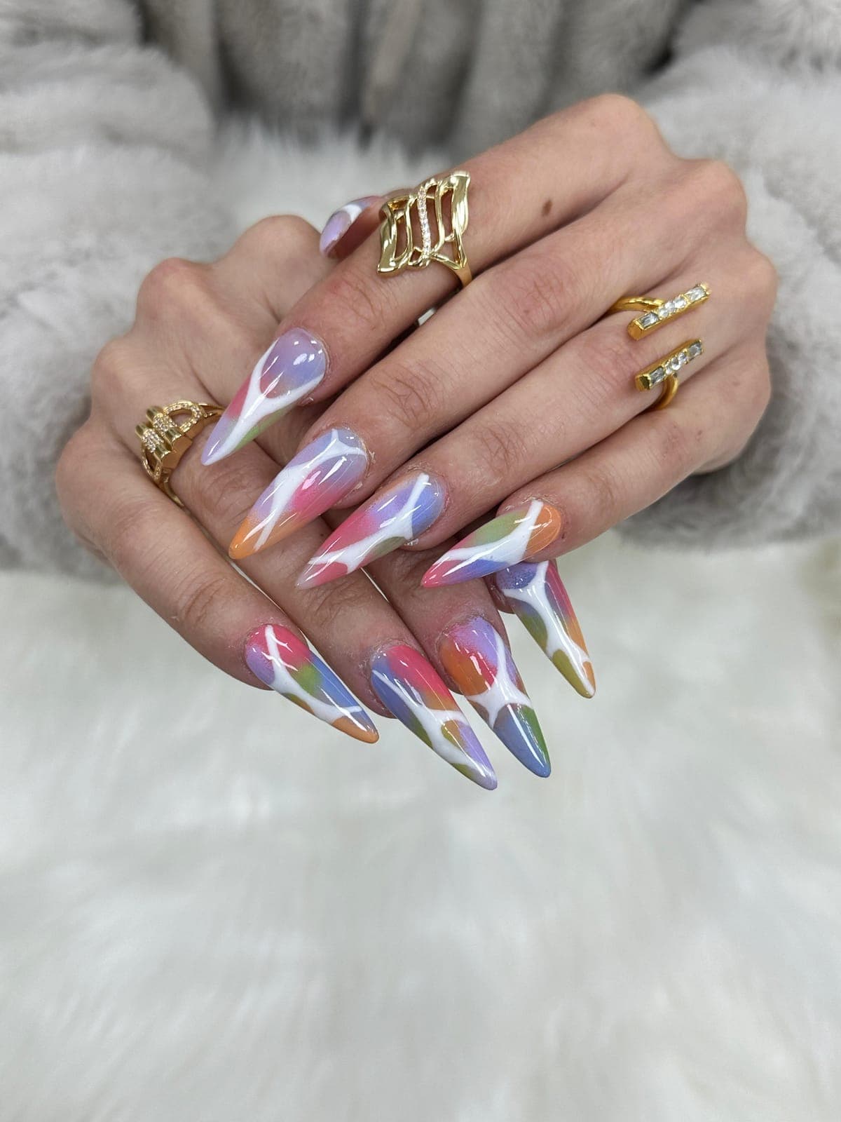 Almond nails with pastel swirls