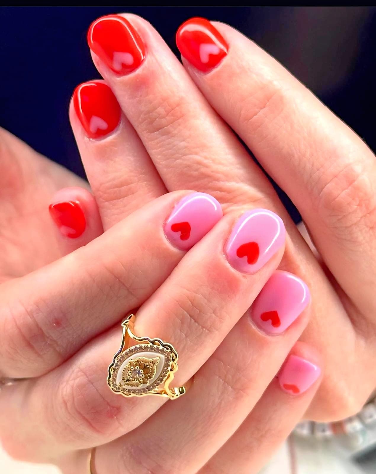 Red and pink nails with hearts