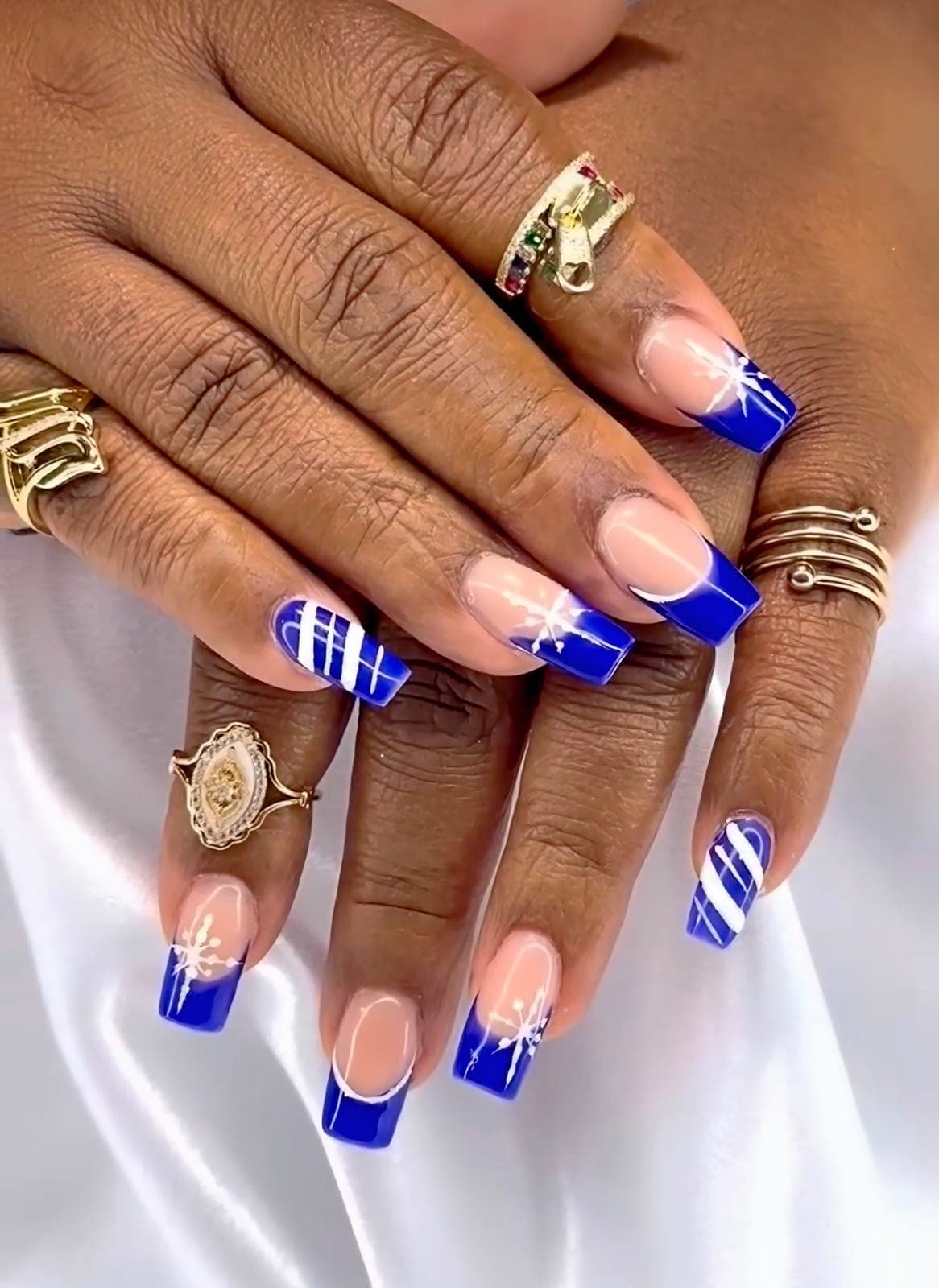 Royal blue French tips with stripe accents