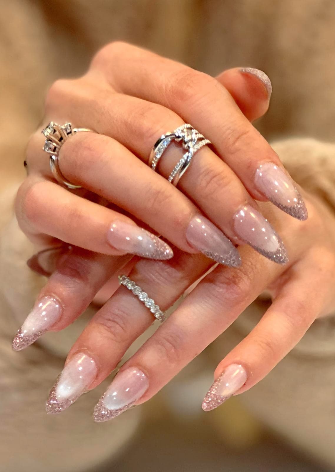 Sheer glitter almond nails